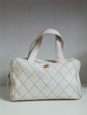 CHANEL VTG WHITE WILD STICH AS IS BAG.